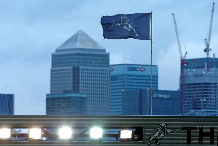 A flag flies above The Den stadium in south London