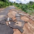 Road in Edo State destroyed by flood [TrackaNG]