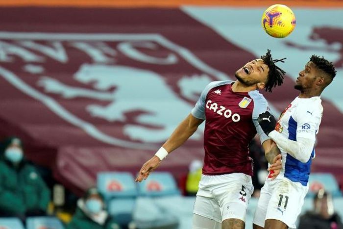 Aston Villa's Tyrone Mings (left) was sent off for two clashes with Crystal Palace's Wilfried Zaha (right)