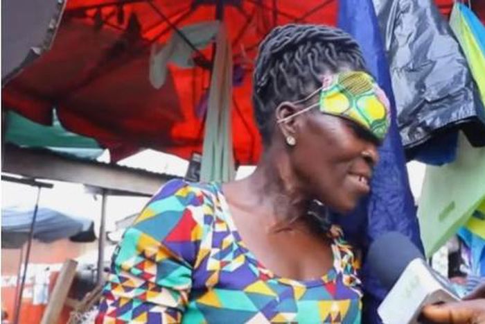 Ghanaian woman gives an interesting reason why she wears her mask the forehead