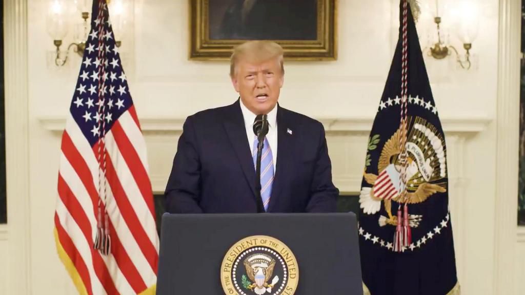 US President Donald Trump gives an address, a day after his supporters stormed the US. Capitol.