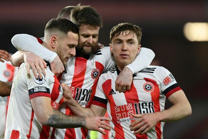 Billy Sharp (left)scored the winner as Sheffield United ended a 20-game run without a win in the Premier League