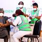Dr. Faisal Shuaib, ED/CEO NPHCDA, receives his first shot of the COVID-19 vaccine. [Twitter/@NphcdaNG]