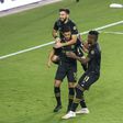 Los Angeles FC talisman Carlos Vela is mobbed by team-mates during Saturday's CONCACAF Champions League semi-final win over Mexico's Club America