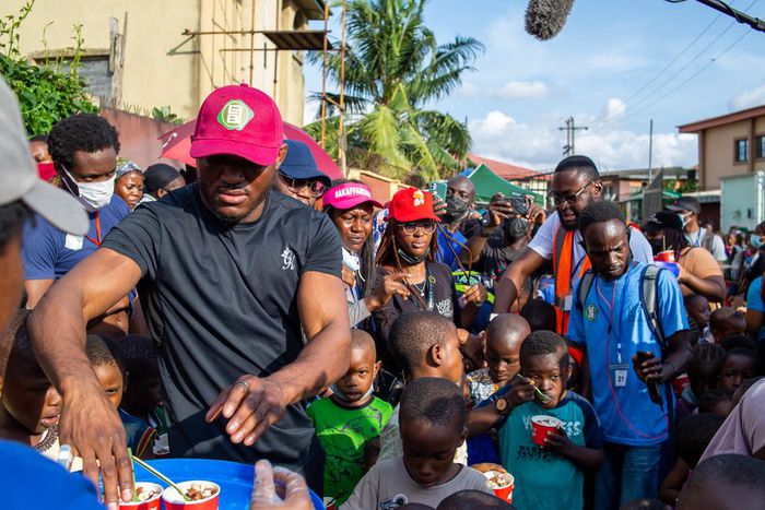 Champion and family man, Kamaru Usman shares an unforgettable CSR experience, feeds 1000 children