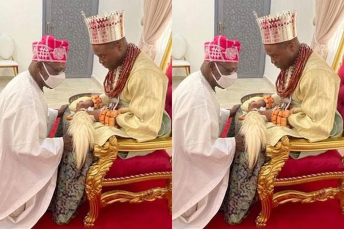 Ex President Obasanjo kneels before the new Olu of Warri at the thanksgiving service (Vanguard)