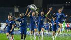 Chelsea players celebrate with the trophy after beating Manchester City in the Champions League final in Porto