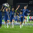 Chelsea players celebrate with the trophy after beating Manchester City in the Champions League final in Porto