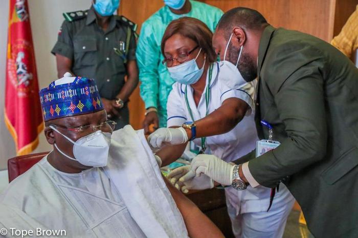 Senate President Ahmad Lawan receives first jab of Oxford-AstraZeneca COVID-19 vaccine. [Tope Brown]