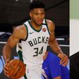 Giannis Antetokounmpo and Akin Omotoso [Sports illustrated/ Helen Herimbi]