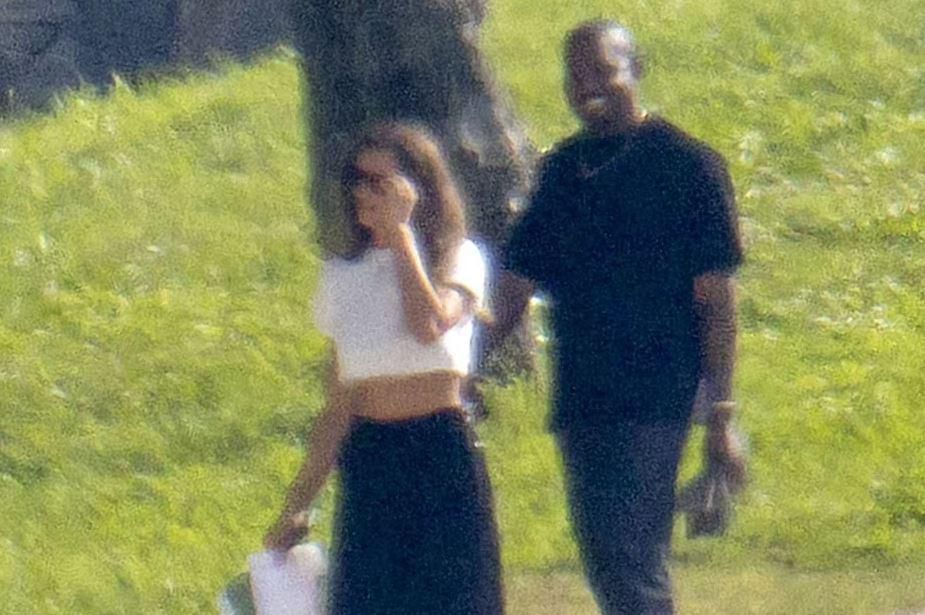 kanye west flanked by his reported new girlfriend Irina Shayk [DailyMail]