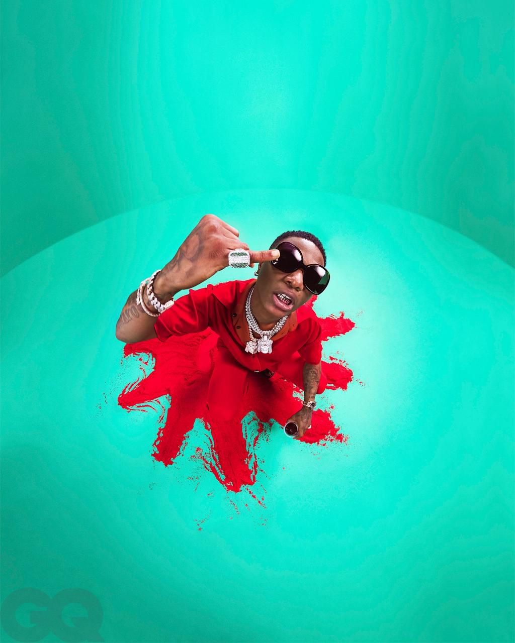 Wizkid in  Eftychia shirt and sunglasses from Courrèges [GQ]