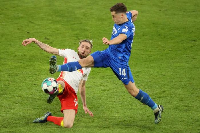 No way through: Leipzig midfielder Kevin Kampl (left) tussles with Hoffenheim's Christoph Baumgartner