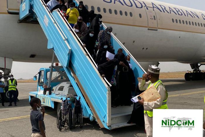 420 Nigerian returnees arrive Abuja from Saudi Arabia . (NIDCOM)