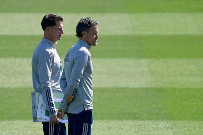 Staying focused: Spain coach Luis Enrique (R) supervised training in Madrid on Wednesday