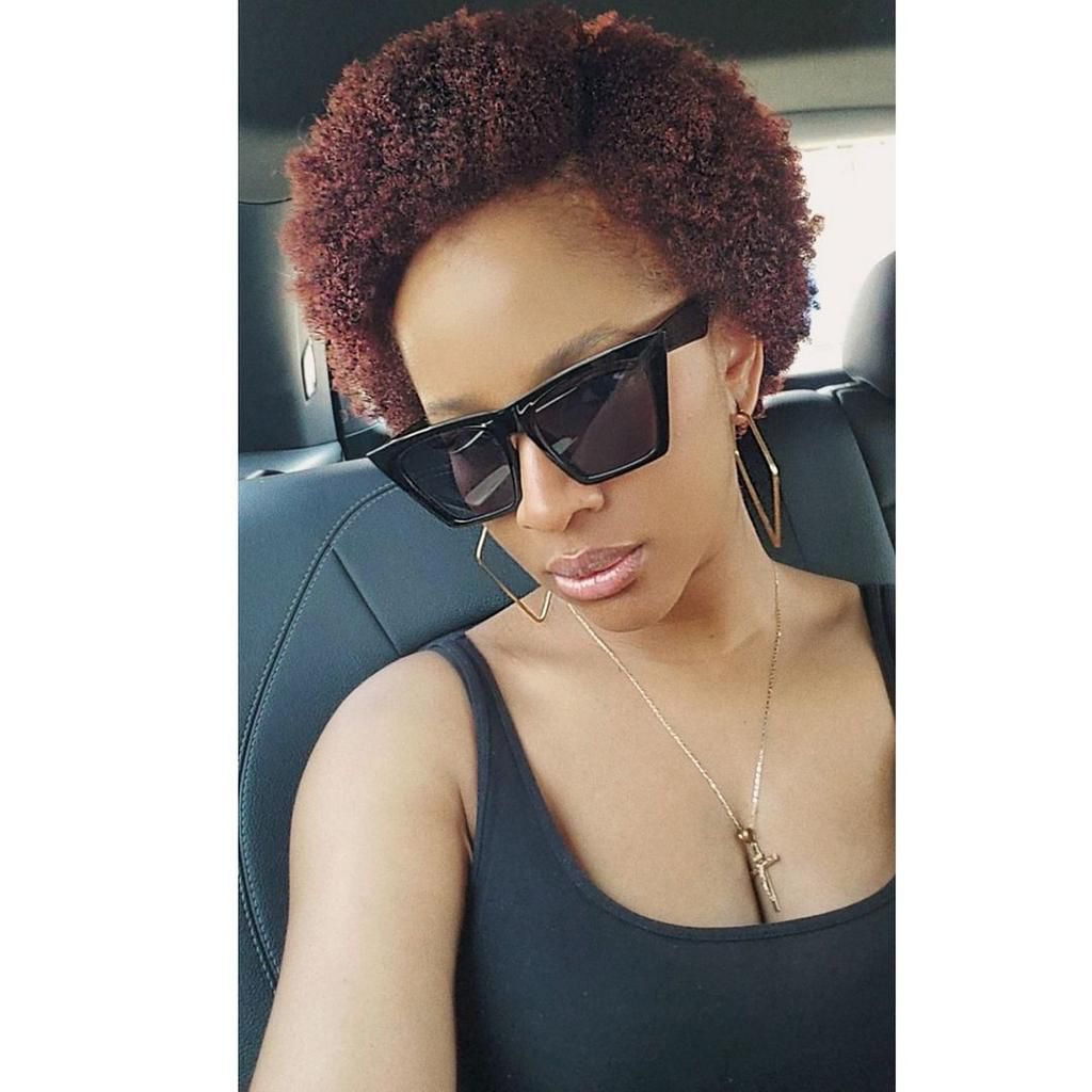 Adesua rocking a parted afro [instagram/adesua]