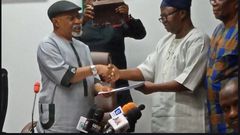 Minister of Labour and Emplyment, Dr Chris Ngige and the President of the Academic Staff Union of Universities, Prof Biodun Ogunyemi. (Legit).