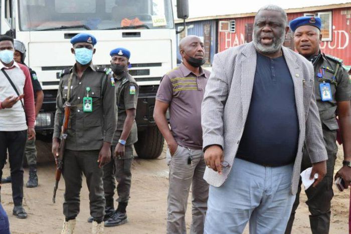 The Lagos State Commissioner for Physical Planning and Urban Development, Dr Idris Salako, leading demolition exercise on estate encroaching Ojota-Maryland wetland on Thursday. [NAN]