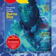 Burna Boy wearing a clear Louis Vuitton suit on the cover on GQ {twitter/britishGQ}