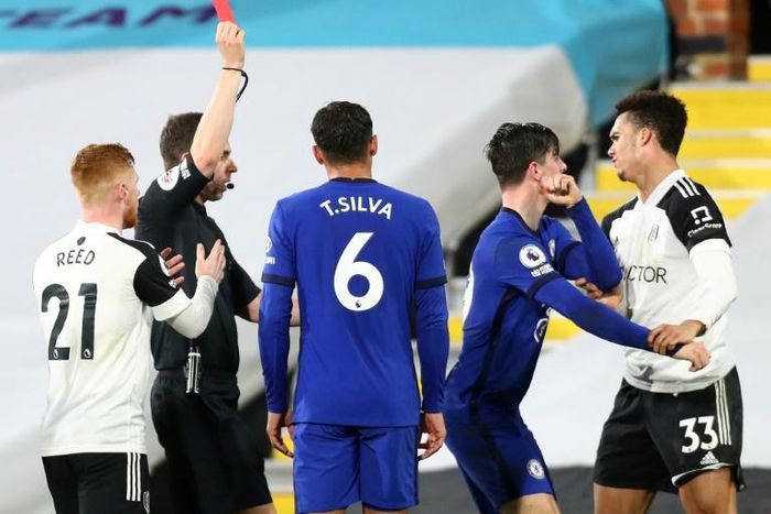 Red mist: Fulham defender Antonee Robinson (right) left his side a man down for the entire second half