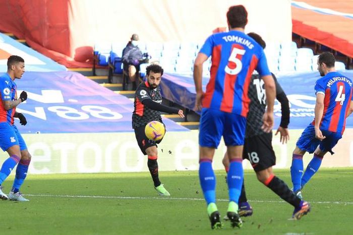 Mohamed Salah (C) scores his second goal for Liverpool in the 7-0 rout of Crystal Palace.