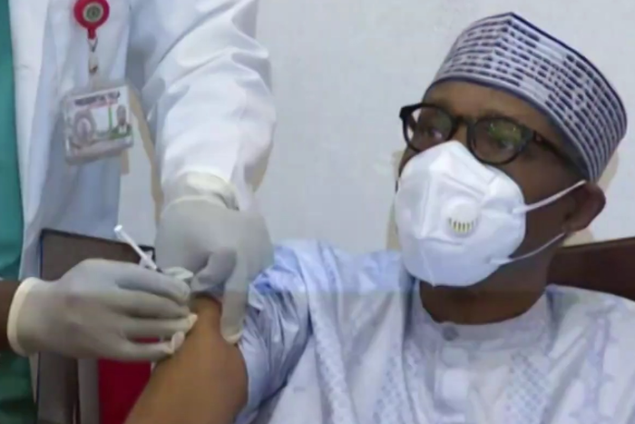 Buhari receiving COVID-19 vaccines