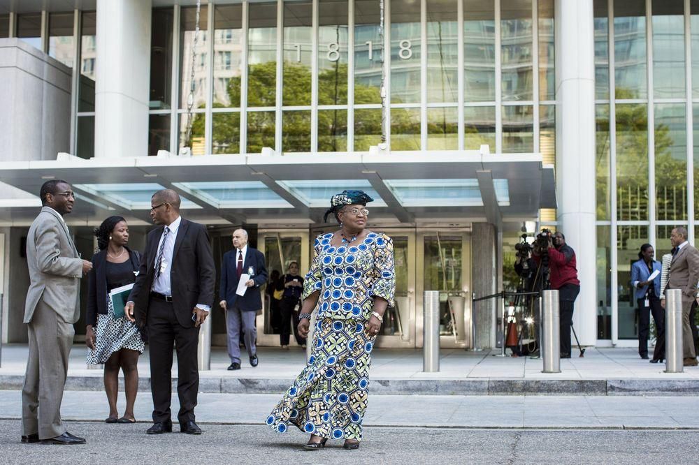 Okonjo-Iweala leaves World Bank headquarters in Washington in 2012.(Photographer: T.J. Kirkpatrick/Bloomberg)