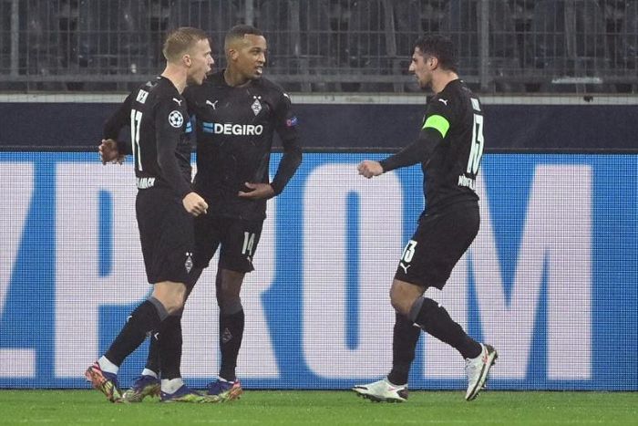 Moenchengladbach forward Alassane Plea (C) has scored five Champions League goals in as many games this season