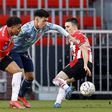 Ajax stayed in control of the Dutch title race with a draw at PSV