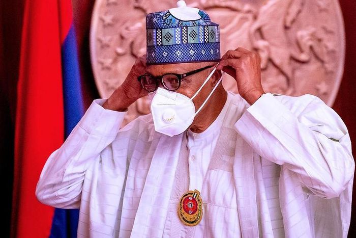 President Muhammadu Buhari at the State House, Abuja, received the Presidential Task Force on COVID19’s End of Year report from members of the Task Force led by SGF, Boss Mustapha. [Twitter/@BashirAhmaad]