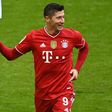 Robert Lewandowski celebrates his hat-trick on Saturday which leaves him five goals short of the Bundesliga record