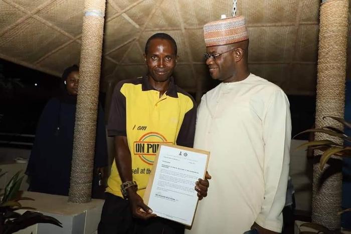 R-L Gov. Yahaya Bello and his newly appointed speech impaired Senior Special Assistant, Peter Aliyu. (Emporium Reporters)