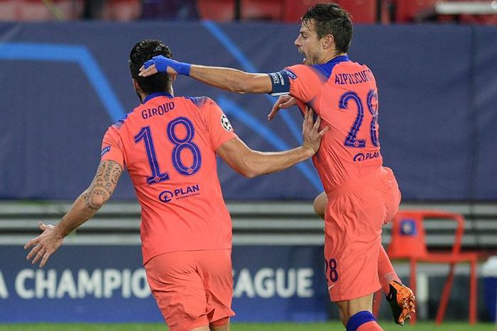 Giroud (L) produced a remarkable four-goal display