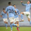 Manchester City midfielder Phil Foden (right) celebrates scoring against Brighton