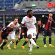 AC Milan's Franck Kessie slotted in from the penalty spot in a 2-1 win over Bologna.