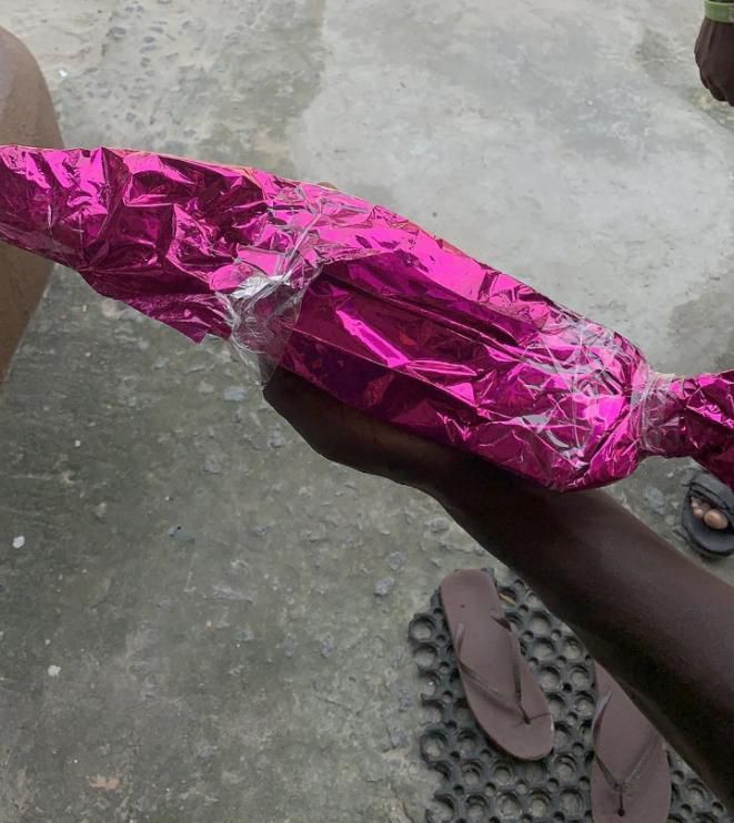 Confusion as bride receives wrapped cutlass from anonymous guest