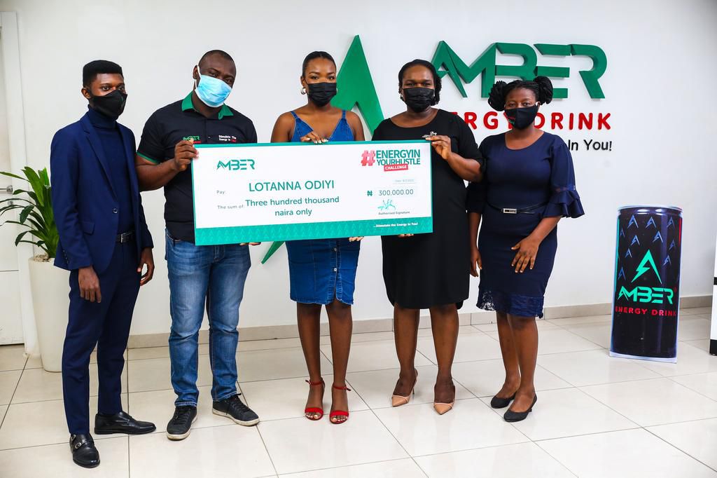 L:R: Accountant, Amber Drinks Ltd, Olawale Amusiru; Ass. Head of Sales, Amber Drinks Ltd, Korede Omole; Amber Energy In Your Hustle Challenge winner, Lotanna Odiyi; Head of Sales, Amber Drinks Ltd,Temitope Adetiba and Legal Officer, Amber Drinks Ltd, O...