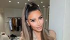 Kim Kardashian in a sleek high ponytail {instagram/kimkardashian}