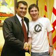 Happier times: Joan Laporta shook hands with Lionel Messi in 2005 after the Argentine signed a nine-year contract extension