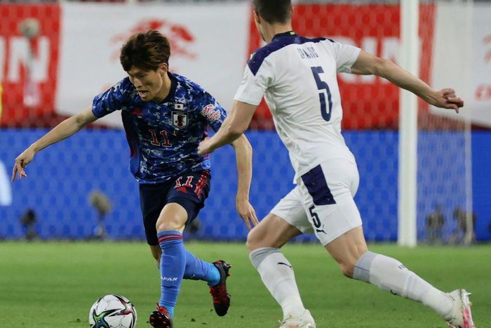 Japan midfielder Kyogo Furuhashi (L)