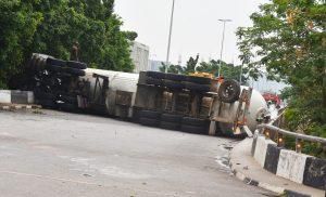 A tanker loaded with cooking gas that fell across the road on the Constitution Avenue, Central Business District in Abuja on Wednesday. [NAN]