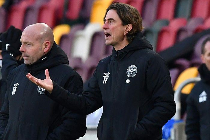 Brentford manager Thomas Frank (R)