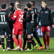 Leverkusen midfielder Nadiem Amiri (2nd from left) argues with Union Berlin players after the final whistle on Friday