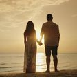 Stock photo of a couple's silhouette on a beach [Credit - Shutterstock]