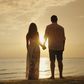 Stock photo of a couple's silhouette on a beach [Credit - Shutterstock]