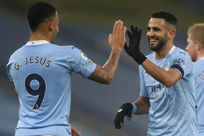 High five: Riyad Mahrez (right) scored a hat-trick as Manchester City returned to goalscoring form with a 5-0 win over Burnley