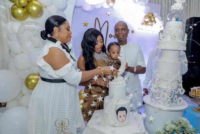 Regina Daniels flanked by her mother, Rita Daniels and her husband, Ned Nwoko with the birthday boy [Instagram/ReginaDaniels]