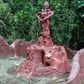 a statue signifying the maternity nature of iya osun at the sacred grove of oshun {culture trip}