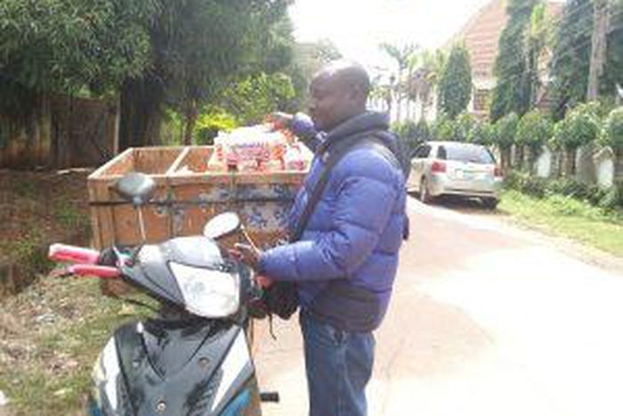 Ali Dahiru, graduate  bread-seller. [NAN]