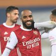 Smiling again: Alexandre Lacazette (centre)scored twice in Arsenal's 4-0 thrashing of West Brom